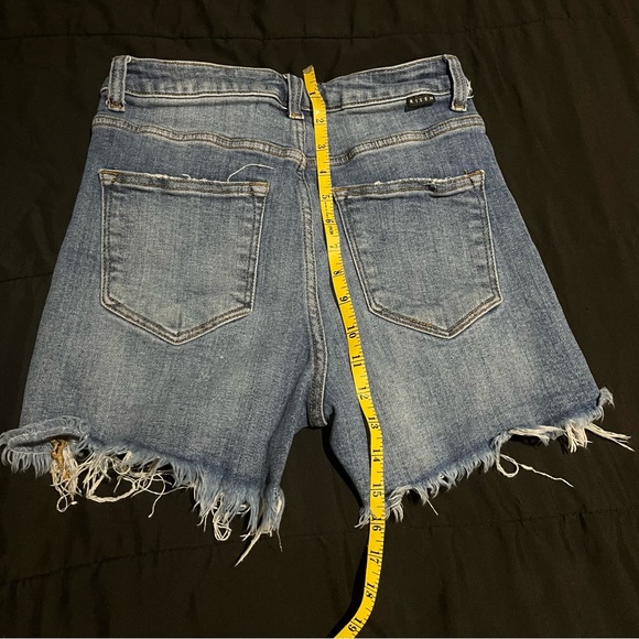 Risen high rise. Distressed jean shorts. - Picture 9 of 9